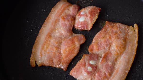 Bacon are Cooked in a Pan