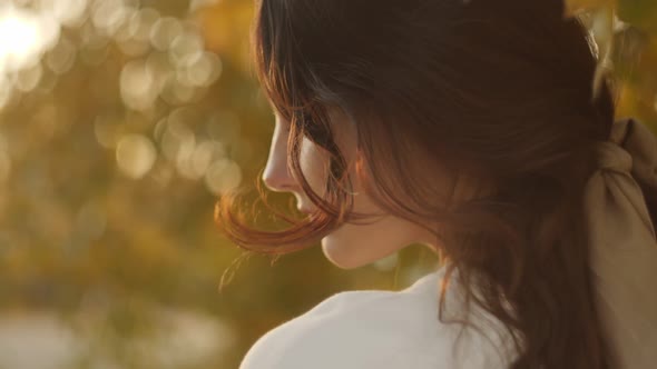 Woman in Autumn Park