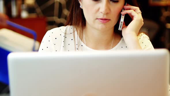 Businesswoman talking on mobile phone