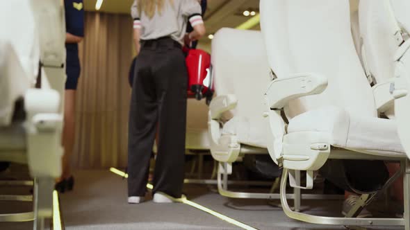 Cabin Crew Lift Luggage Bag in Airplane