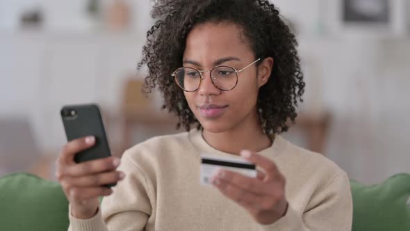 Portrait of Online Shopping on Smartphone By African Woman