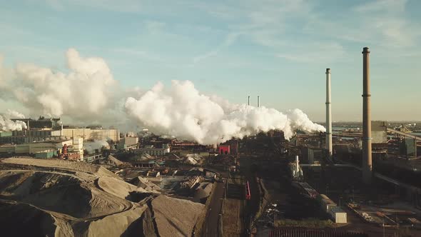 Aerial view of factory Tata Steel with smoking chimneys in Holland