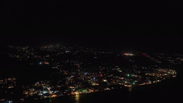 Aerial night view of Kamari area on Santorini island