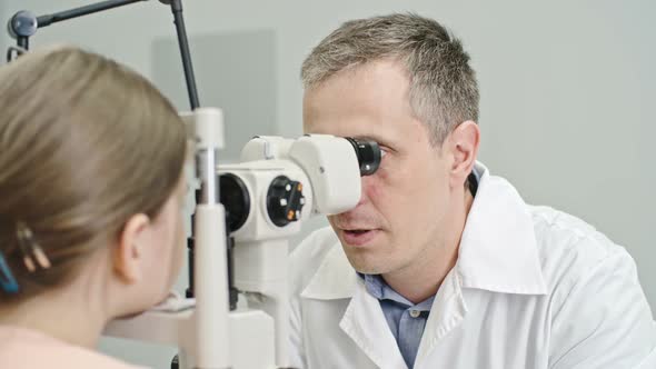 Pediatric Optician Using Slit Lamp