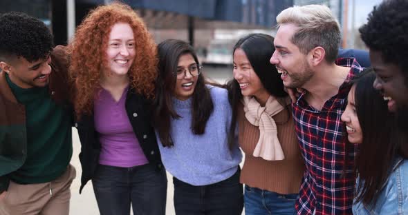 Young diverse people having fun outdoor laughing together - Diversity concept