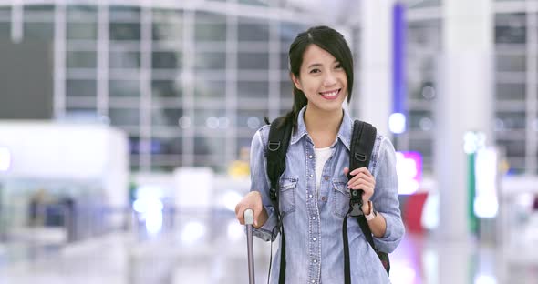 Backpacker go for a trip in the airport