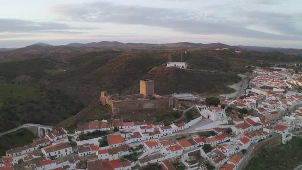 Aerial drone view of Mertola in Alentejo, Portugal at sunset