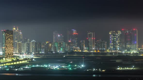 Buildings on Al Reem Island in Abu Dhabi Night Timelapse From Above