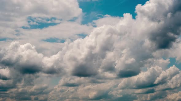 Timelapse of Cumulus Clouds Moving in the Blue Sky