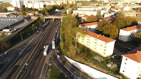 Drone Footage of Cars Drive at Cross Road