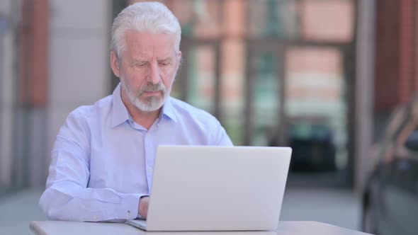 Outdoor Cheerful Old Man Smiling at Camera