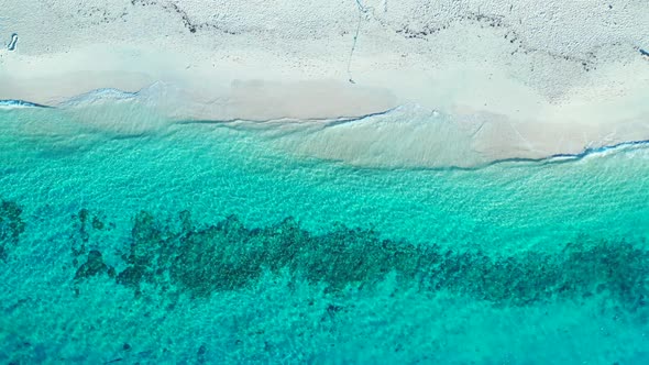 Aerial flying over sky of beautiful lagoon beach trip by clear sea with white sand background of a d