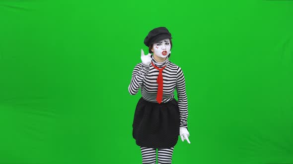 Mime Girl Is Scolding Someone and Showing Fist. Chroma Key.