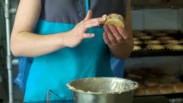 Female Baker Making Cookies at Cafe