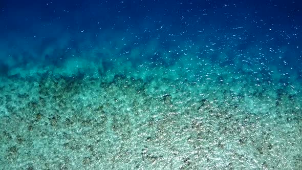 Aerial drone nature of tropical shore beach by blue sea and sand background