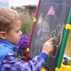 Young Artist Draws on the Board - VideoHive Item for Sale