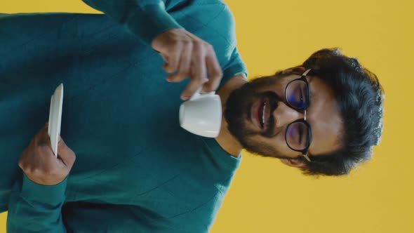 Young Man Drinking Coffee