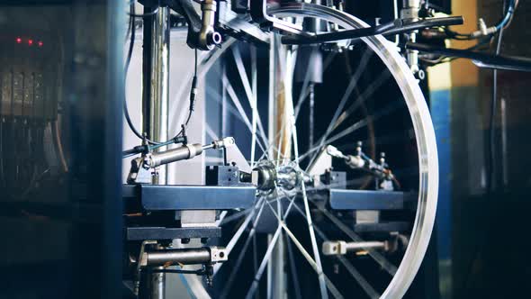 Bicycle Wheel Truing Machine at a Bicycle Factory