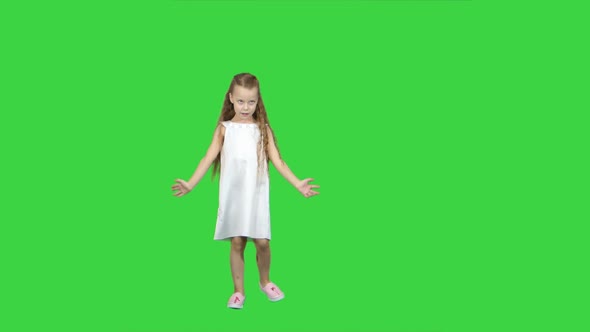 Dancing Little Blond Girl Singing on a Green Screen, Chroma Key