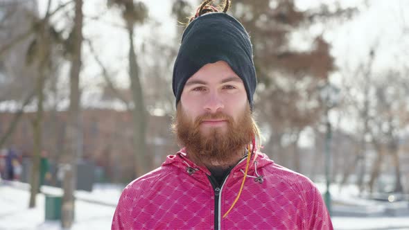 Portrait of Redhaired Bearded Man in Winter Park