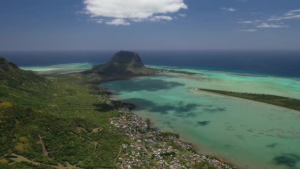 Beautiful Bird's-eye View of Mount Le Morne Brabant and the Waves of the Indian Ocean in Mauritius