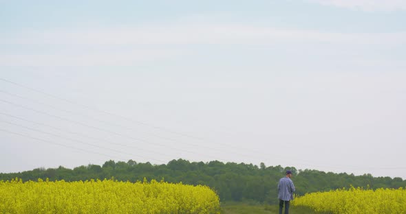 Agriculture Farmer Examining Field Modern Farming