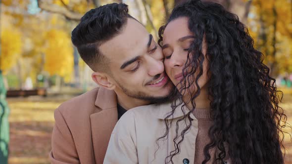 Closeup Hispanic Couple Guy Embracing Girl Romantic Date in Autumn Park Lovers Enjoy Tenderness