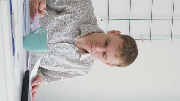 Confident Businessman Working in Office