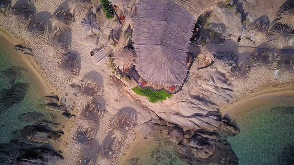 Man in beach bar aerial shot