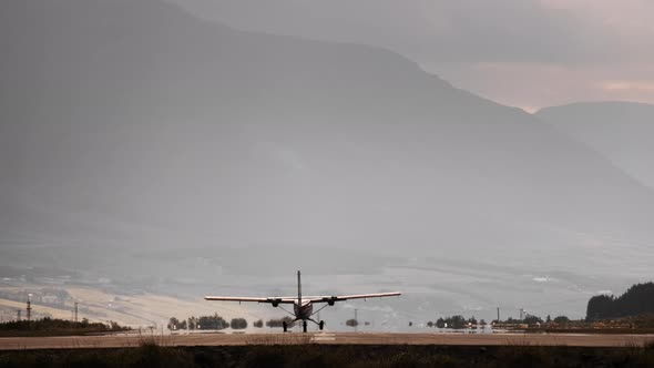 Propellor Airplane Taking Off From Runway