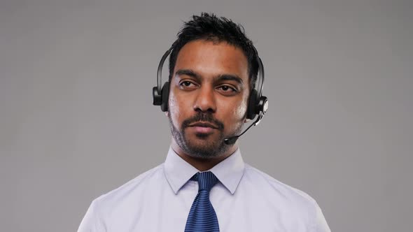 Indian Businessman or Helpline Operator in Headset 4