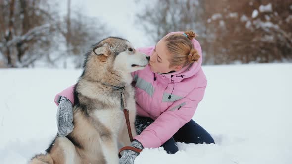 Favorite Dog Kisses Her Mistress