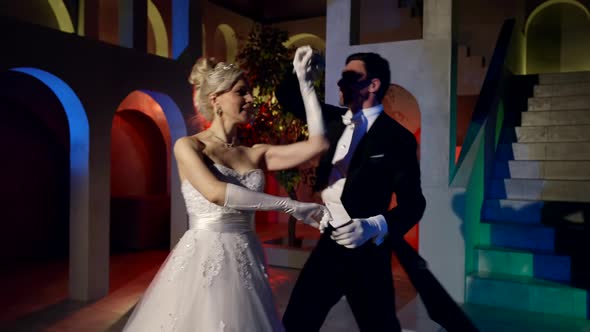 Lovers are Dancing Waltz in Ballroom in Royal Castle in Night Romantic Atmosphere of Fabulous Dance