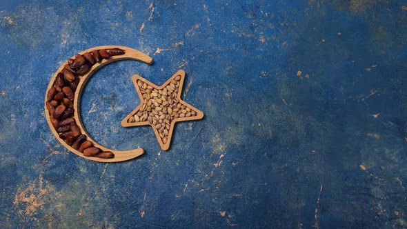 Ramadan a Crescent Moon with a Star and Dates