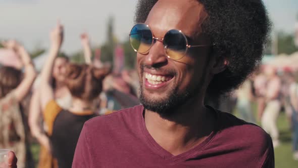 African man dancing at the festival