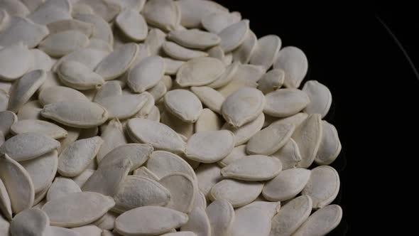 Cinematic, rotating shot of pumpking seeds - PUMPKIN SEEDS 030