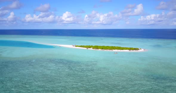 Tropical birds eye travel shot of a sandy white paradise beach and blue ocean background in hi res 4