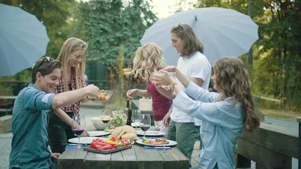 People Eating Healthy Food On Outdoor Party