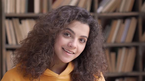 Smiling Hispanic Teen Girl School Student Looking at Camera Close Up Portrait