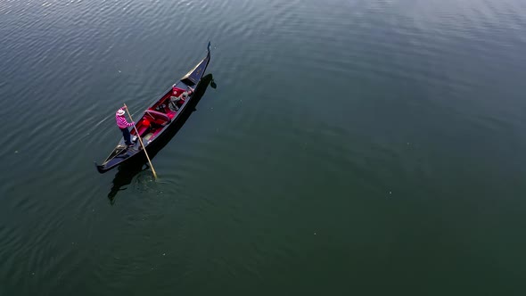 Gondola floating on water