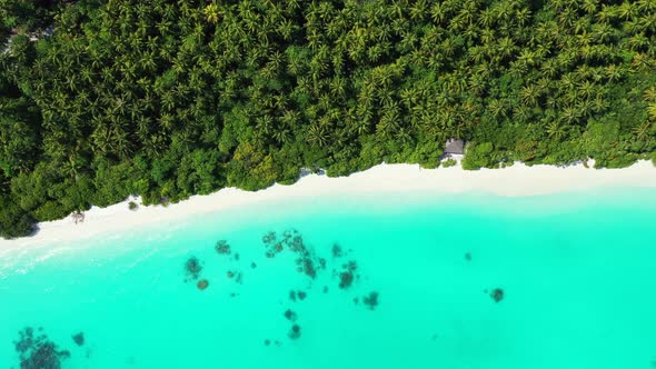 Luxury drone clean view of a paradise sunny white sand beach and aqua blue ocean background in high 