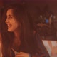 Young woman talks and laughs with friends - VideoHive Item for Sale