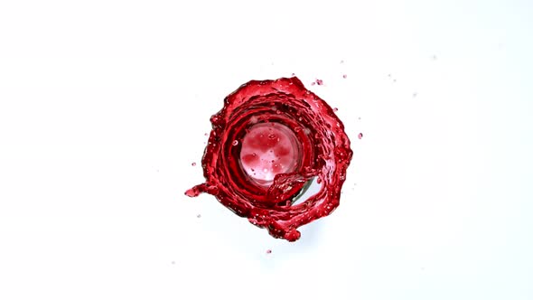 Super Slow Motion Shot of Red Wine Vortex Splash Isolated on White Background at 1000 Fps