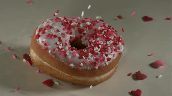 Doughnuts falling and bouncing in ultra slow mo 1500fps - reflective surface - DOUGHNUTS PHANTOM 024