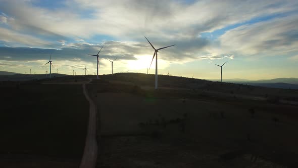 Wind Turbines And Sunrise