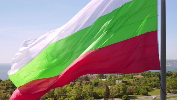 Bulgaria Flag Against City Varna at Summer Day