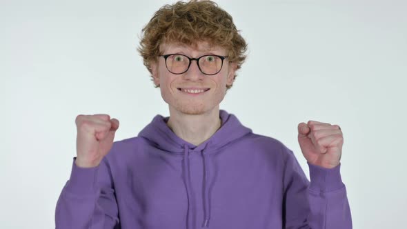 Successful Redhead Young Man Celebrating, White Background