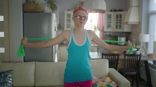 Cute Funny Young Gay Man Wearing Glasses And Bright Sportswear