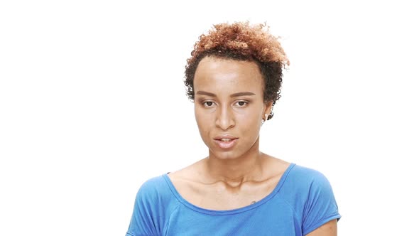 Annoyed Young Beautiful African Girl Over White Background