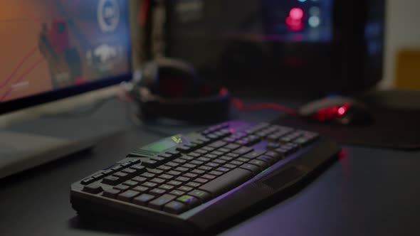 Close Up of Professional RGB Keypad in Empty Gaming Room